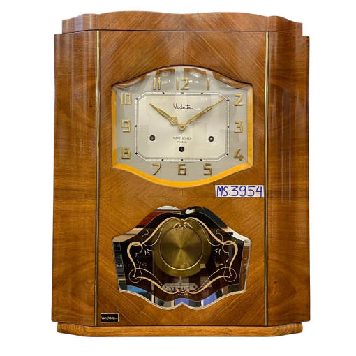 Đồng hồ Vedette 8 gông số nổi vàng kim loại thùng nu đối xứng