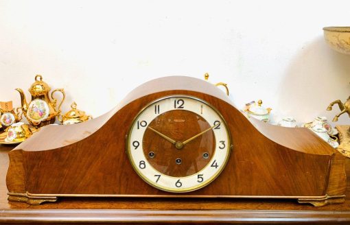 Đồng hồ vai bò Mello thùng vân nu âm thanh du dương nhập đức