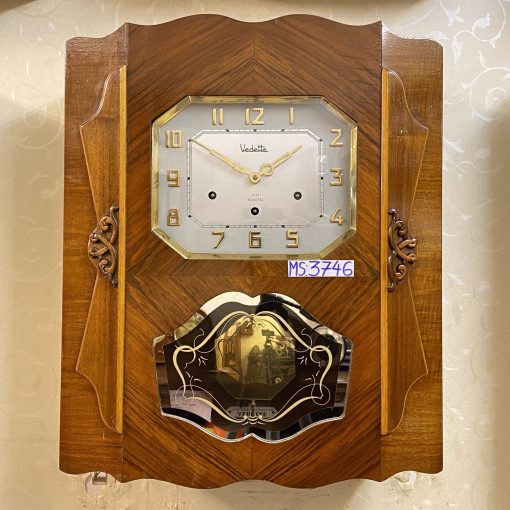 Đồng hồ cổ Vedette số nổi vàng thùng vân nu đối xứng