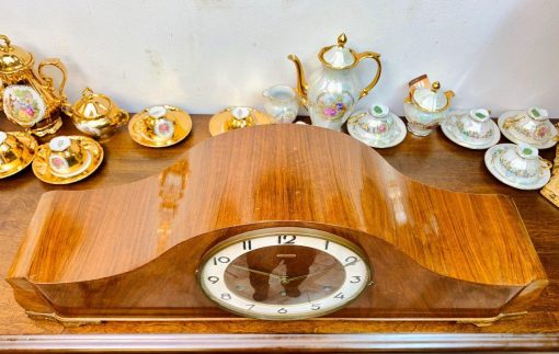 Đồng hồ vai bò Mello thùng vân nu âm thanh du dương nhập đức