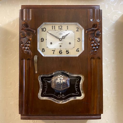 Đồng hồ cổ Jura 8 gông 8 búa số nổi cùng với thiết kế thùng chạm chùm nho máy vách đồng đẹp