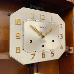Đồng hồ Vedette 8 gông số nổi vàng kim loại thùng nu đối xứng